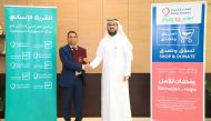 CEO’s Assistant for the Resources Development and Media sector at Qatar Charity Ahmad Yousef Fakhroo, and Regional Manager of Lulu Hypermarket Qatar Shanavas Padiyath during the signing ceremony.