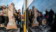 People fleeing Russian invasion of Ukraine change trains at Euroterminal to be transferred to temporary accommodation centers around the country, in Slawkow, Poland March 5, 2022. Grzegorz Celejewski/Agencja Wyborcza.pl via REUTERS/File Photo

