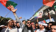 Supporters of the Pakistan Tehreek-e-Insaf (PTI) political party, chant slogans accusing the U.S. of plotting to overthrow Pakistani Prime Minister Imran Khan, during a protest in Peshawar, Pakistan, April 1, 2022. (REUTERS/Fayaz Aziz)