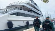 Spanish Civil Guards stand by the Tango superyacht, suspected to belong to a Russian oligarch, as it is docked at the Mallorca Royal Nautical Club, in Palma de Mallorca, in the Spanish island of Mallorca, Spain, April 4, 2022. Juan Poyates Oliver/Handout via REUTERS THIS IMAGE HAS BEEN SUPPLIED BY A THIRD PARTY. MANDATORY CREDIT.



