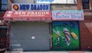 A Chinese restaurant and barber shop in Harlem are closed, as retail sales suffer record drop during the outbreak of the coronavirus disease (COVID-19) in New York City, New York, U.S., April 15, 2020. REUTERS/Bryan R Smith/

