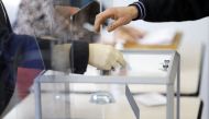 A voter casts their ballot in the first round of the 2022 French presidential election at a polling station in Pontaumur, France, April 10, 2022. Reuters/Stephane Mahe