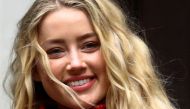 Actor Amber Heard reacts as she arrives at the High Court in London, Britain July 16, 2020. REUTERS/Hannah McKay/File Photo