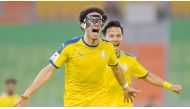 Ahmed Alaadin celebrates after scoring Al Gharafa's second goal against Ahal FC.