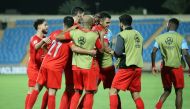 Al Duhail players celebrate their win over Pakhtakor.