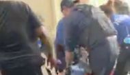 A person is carried away in a gurney in the aftermath of a shooting that took place at a shopping mall in Columbia, South Carolina, in this screengrab from a video obtained from social media. SC Lash Extensions via Reuters