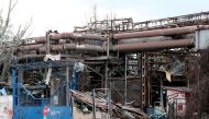 A view shows the gates of the Illich Steel and Iron Works damaged during Ukraine-Russia conflict in the southern port city of Mariupol, Ukraine April 15, 2022. Reuters/Alexander Ermochenko/File Photo