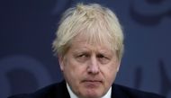 British Prime Minister Boris Johnson looks on while delivering a speech on immigration, at Lydd Airport, Britain April 14, 2022. Matt Dunham/Pool via REUTERS/File Photo
