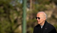 U.S. President Joe Biden walks towards his motorcade at Fort Lesley J. McNair, following spending the weekend at Camp David in Maryland, in Washington, U.S., April 17, 2022. REUTERS/Al Drago