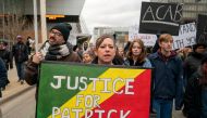 Demonstrators protest the killing of Patrick Lyoya, an unarmed Black man who was shot and killed by a Grand Rapids Police officer during a traffic stop on April 4, in Grand Rapids, Michigan, U.S., April 16, 2022. REUTERS/David 'Dee' Delgado