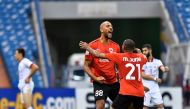 Al Rayyan’s Steven N’zonzi celebrates with team-mate Mohammed Juma after scoring team’s second goal, yesterday. 