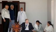 Britain's Prime Minister Boris Johnson spins cotton on a wheel during his visit to Gandhi Ashram in Ahmedabad, India, April 21, 2022. Reuters/Amit Dave 