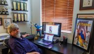 Scott Dunbier, who has gathered comic book artists from around the world to create a book about the war in Ukraine as he helps raise money for Ukraine refugees, looks on from his home in San Marcos, California, U.S., April 19, 2022. Picture taken April 19, 2022. REUTERS/Mike Blake
 