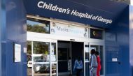 People walk into the Children's Hospital of Georgia in Augusta, Georgia, U.S., January 14, 2022. REUTERS/Hannah Beier

