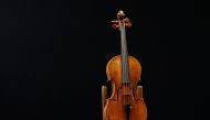 A rare 1736 violin by Italian luthier Guarneri del Gesu is displayed during a media preview at Aguttes auction house ahead of the violin's auction in Neuilly-sur-Seine, near Paris, France, April 26, 2022. REUTERS/Benoit Tessier
 