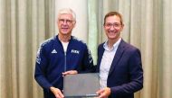 Aspire Academy Director General Ivan Bravo (right) and FIFA’s Chief of Global Football Development Arsène Wenger pose for a photo. 