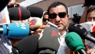 FILE PHOTO: Soccer agent Mino Raiola speaks to the media as he arrives at FC Barcelona's office in Barcelona, Spain August 26, 2010. REUTERS/Albert Gea