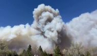 FILE PHOTO - Smoke drifts from the Tunnel Fire north of Flagstaff, Arizona April 19, 2022 in a still image from video. Image taken April 19, 2022. REUTERS/Reuters TV

