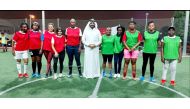 President IWFF Asia, Farhan Al Sheikh Al Sayed, and players during the Ramadan Walking Football Championship. 