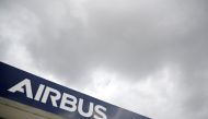 FILE PHOTO: The logo of Airbus is pictured at the entrance of the Airbus facility in Bouguenais, near Nantes, France, July 2, 2020. REUTERS/Stephane Mahe/File Photo
