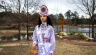 Choctaw Indian Princess Shemah Crosby poses for a photo at Lake Pushmataha where the Mississippi Band of Choctaw Indians erected a COVID-19 memorial in March of 2021. (REUTERS/Kathleen Flynn)