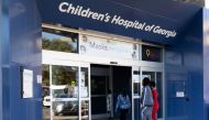 People walk into the Children's Hospital of Georgia in Augusta, Georgia, U.S., January 14, 2022. REUTERS/Hannah Beier

