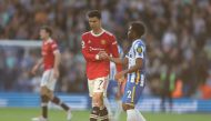 Manchester United's Cristiano Ronaldo shakes hands with Brighton & Hove Albion's Tariq Lamptey after the match REUTERS/Ian Walton 