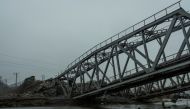A view shows a railway bridge over the Irpin river destroyed by heavy shelling, as Russia's attack on Ukraine continues, in the town of Irpin, in Kyiv region, Ukraine March 29, 2022. Reuters/Serhii Mykhalchuk/File Photo
