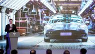 Tesla Inc CEO Elon Musk speaks next to a screen showing an image of Tesla Model 3 car during an opening ceremony for Tesla China-made Model Y program in Shanghai, China January 7, 2020. REUTERS/Aly Song/File Photo