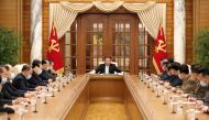 North Korean leader Kim Jong Un chairs a Worker's Party meeting on coronavirus disease (COVID-19) outbreak response in this undated photo released by North Korea's Korean Central News Agency (KCNA) on May 12, 2022. KCNA via REUTERS