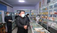 North Korean leader Kim Jong Un wears a face mask amid the coronavirus disease (COVID-19) outbreak, while inspecting a pharmacy in Pyongyang, in this undated photo released by North Korea's Korean Central News Agency (KCNA) on May 15, 2022. KCNA via REUTERS