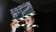 The 75th Cannes Film Festival - Cannes, France, May 16, 2022. Vincent Lindon, Jury President of the 75th Cannes Film Festival, holds a film clapper on the eve of the opening of the film festival. REUTERS/Eric Gaillard
