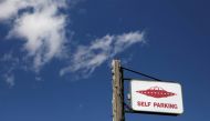 A parking sign at the Little A'Le'Inn as an influx of tourists responding to a call to 'storm' Area 51, a secretive U.S. military base believed by UFO enthusiasts to hold government secrets about extra-terrestrials, is expected in Rachel, Nevada, U.S. September 19, 2019. REUTERS/Jim Urquhart/File Photo