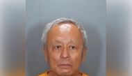 Suspect in the Laguna Woods church shooting David Chou, 68, of Las Vegas is shown in this police booking photo released by the Orange County Sheriff's Department on May 16, 2022. Orange County Sheriff's Department/Handout via Reuters