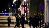 Police officers investigate after several people were killed and others were injured by a man using a bow and arrows to carry out attacks, in Kongsberg, Norway, October 13, 2021. Hakon Mosvold/NTB/via REUTERS/File Photo

