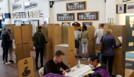 Voters cast their ballots on the day of the national election, at a Bondi Beach polling station in Sydney, Australia, May 21, 2022. Reuters/Loren Elliott