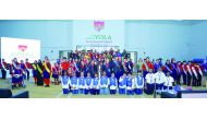 Staff and students during Investiture Ceremony at Loyola International School.