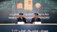 Officials attend an agreement signing ceremony at 14th International Exhibition for Homeland Security and Civil Defense (Milipol) Qatar 2022, yesterday.  