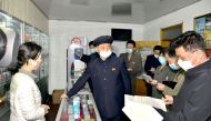 North Korea's Premier Kim Tok Hun, inspects a pharmacy amid the coronavirus disease (COVID-19) pandemic, in Pyongyang