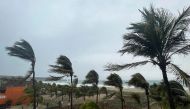 Palm trees sway in the wind as Hurricane Agatha pounds the southern coast of Mexico, in Puerto Escondido, Oaxaca state, Mexico, May 30, 2022. REUTERS/Jose de Jesus Cortes