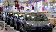FILE PHOTO: Tesla China-made Model 3 vehicles are seen during a delivery event at the carmaker's factory in Shanghai, China January 7, 2020. REUTERS/Aly Song/File Photo
