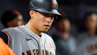 San Francisco Giants first baseman Wilmer Flores (41) celebrates in the dugout after scoring during the first inning against the Miami Marlins at loanDepot Park. Sam Navarro-USA TODAY Sports