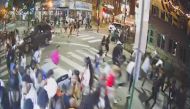 A screen grab from a surveillance video from the shooting shows people on a crowded street running in panic, presumably after gun shots were fired, in Philadelphia, Pennsylvania, U.S., June 4, 2022. South Street CCTV/Handout via REUTERS
