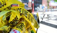 Police tape is pictured at a trash can on the street, at a crime scene after a deadly mass shooting on South Street in Philadelphia, Pennsylvania, U.S., June 5, 2022. Reuters/Bastiaan Slabbers