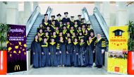 McDonald’s Qatar employees, who graduated from Leading Great Restaurant Training Course offered by Hamburger University, pose for a photograph.
