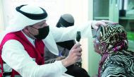 A patient receiving treatment under QRCS health project in Sudan.
