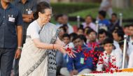 FILE PHOTO: India's Congress Party chief Sonia Gandhi pays homage at the Mahatma Gandhi memorial on the 150th birth anniversary of Gandhi at Rajghat in New Delhi, India October 2, 2019. REUTERS/Adnan Abidi/File Photo
