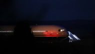 A plane reported by British media to be first to transport migrants to Rwanda is seen at MOD Boscombe Down base in Wiltshire, Britain, June 14, 2022. Reuters/Hannah McKay
