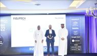 Salem Al Mannai, Group CEO of QIC Group awarding the winner, during InsurTech MENA Summit 2022, in Doha, recently.