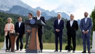 German Chancellor Olaf Scholz speaks next to European Commission President Ursula von der Leyen, Japanese Prime Minister Fumio Kishida, Canadian Prime Minister Justin Trudeau, US President Joe Biden, Italian Prime Minister Mario Draghi and European Council President Charles Michel during the first day of the G7 leaders' summit at Bavaria's Schloss Elmau castle, near Garmisch-Partenkirchen, Germany, on June 26, 2022. (Reuters/Lukas Barth/Pool)
